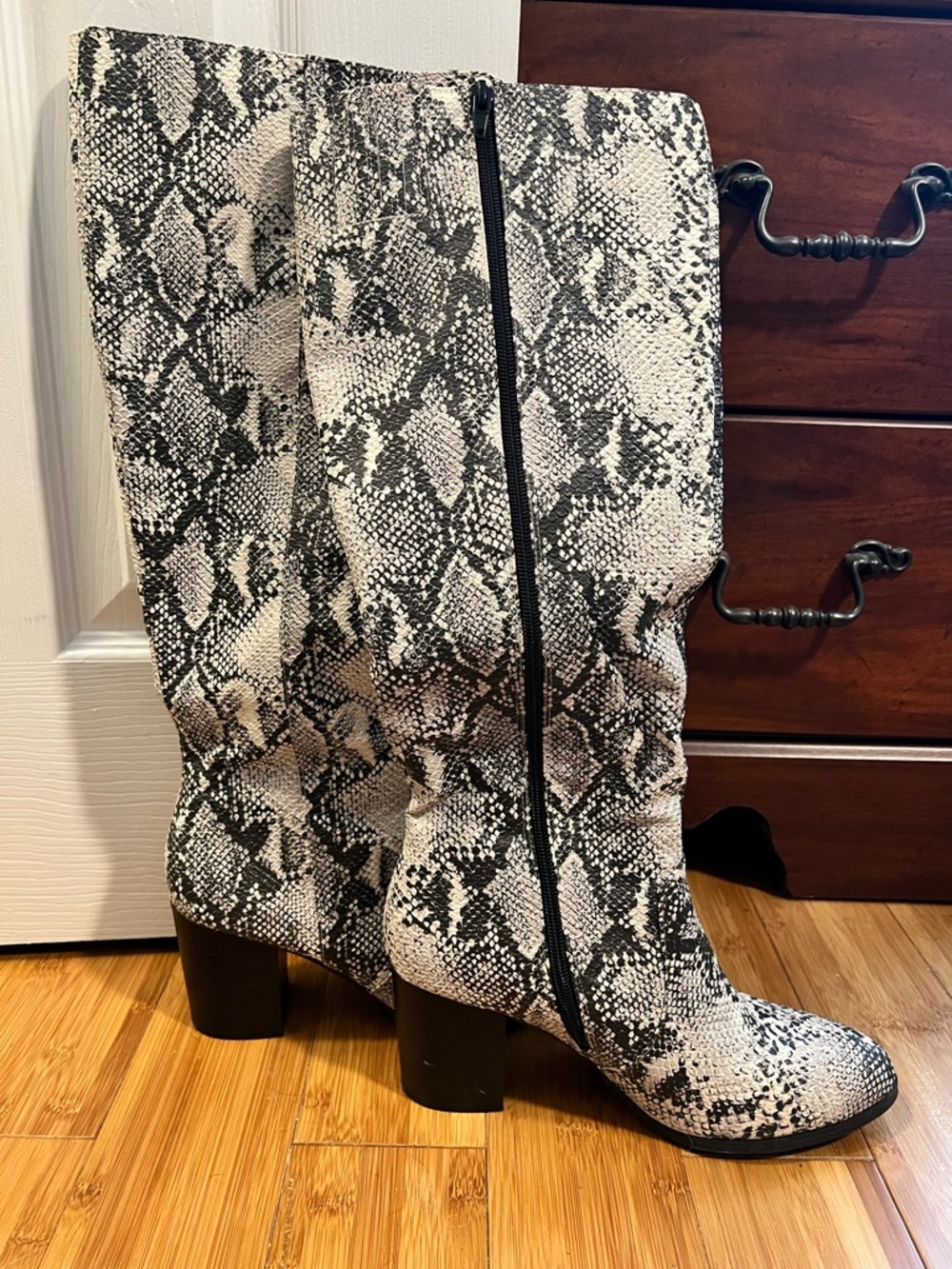 Cupid Snake Print Knee-High Heeled Boots in Black and White